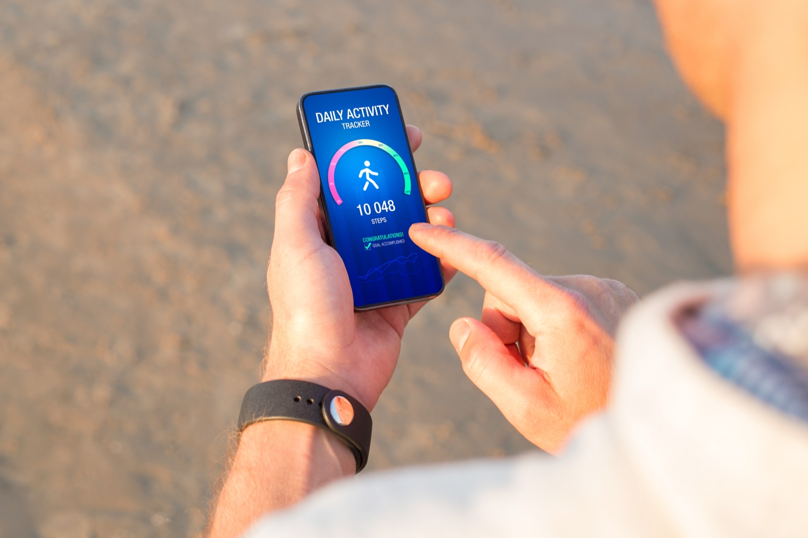 A person walking outdoors, chasing a realistic step goal