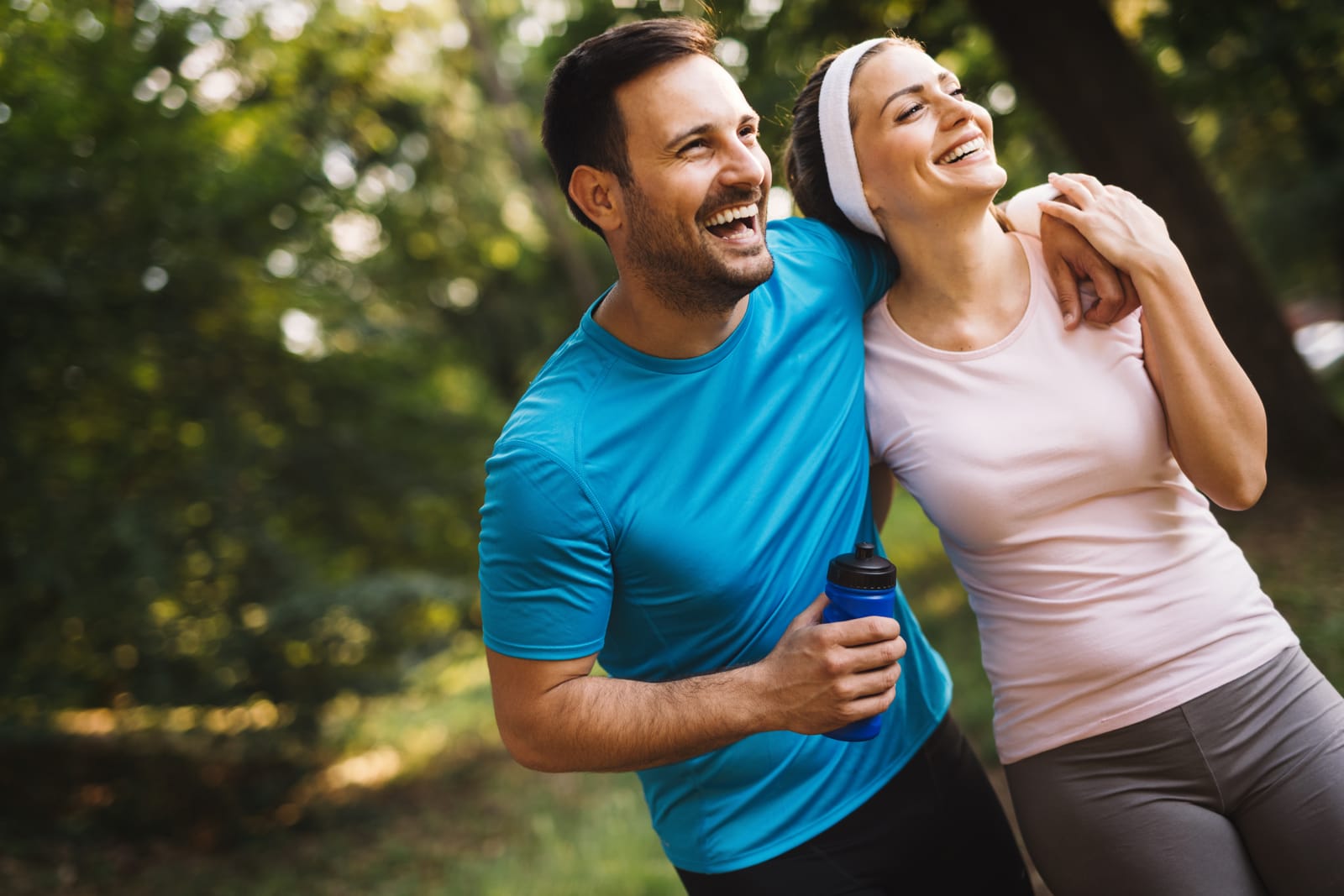 Couple Laughing After Workout