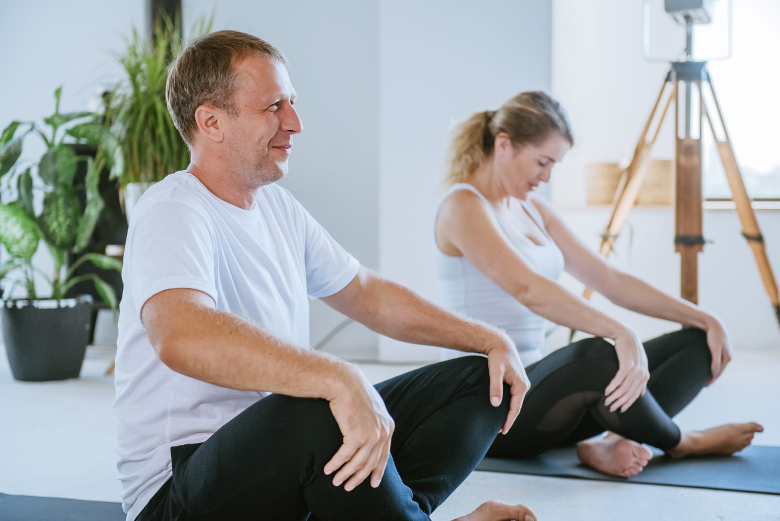 Couple Seated Stretching Studio